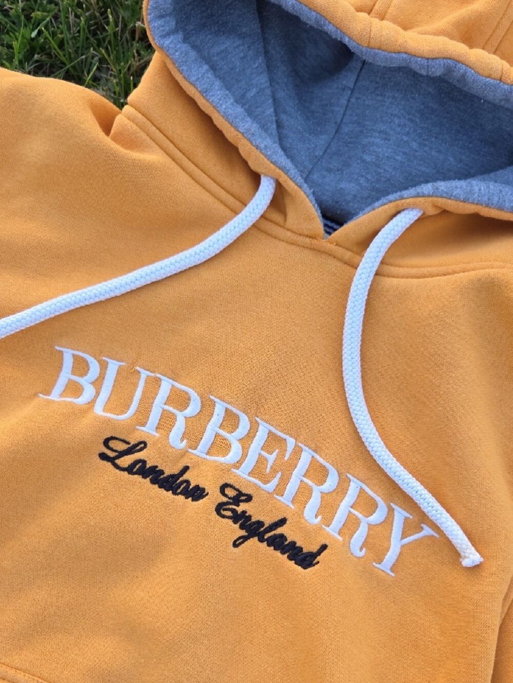 Burberry Orange Pullover Hoodie with Navy & White Sleeve Stripes